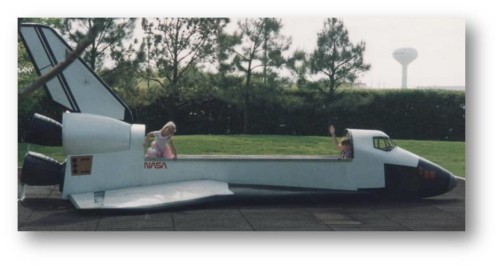 This was the play place at Space Center Houston when I was a child.  I'm the one waving from the cockpit.  My sister is the one in the pink poodle skirt climbing out of the back.