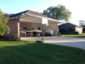 A common sight around Spruce Creek! A house with a plane in the garage.