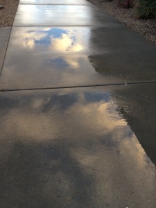 Reflection of the clouds in a puddle
